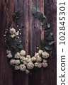 rustic style floral composition with white spring flowers 102845301