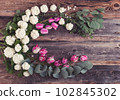 rustic style floral composition with white spring flowers 102845302