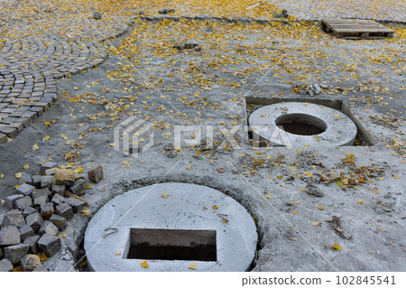 Renovation works are being carried out to reconstruct road using stone. 102845541