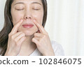 woman taking care of wrinkles 102846075