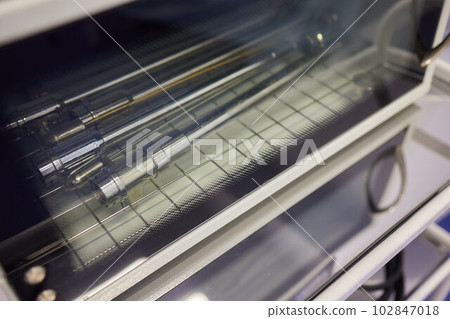 ultrasound machine doctor's hand usg investigation. ultrasound machine doctor's hand usg investigation. 102847018
