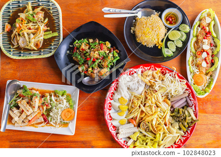 Variety authentic thai traditional meal on table Variety authentic thai traditional meal on table 102848023