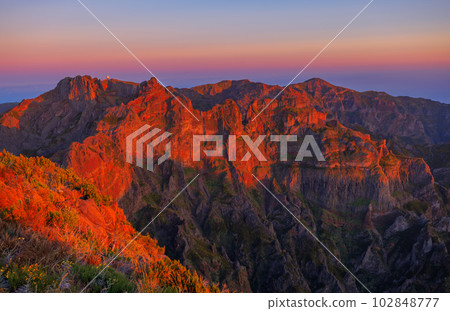 Pico Areeiro mountain peak at Madeira island. Evening view from Ruivo mountain peak. 102848777