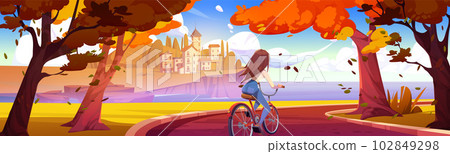 Young woman riding bicycle in autumn park Young woman riding bicycle in autumn park 102849298