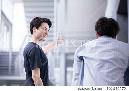 Image of rehabilitation and nursing care crutches and a physical therapist supporting the patient Image of rehabilitation and nursing care crutches and a physical therapist supporting the patient 102850372