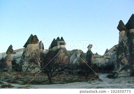 Strangely shaped rocks in the Pasavar area of Cappadocia, Türkiye Strangely shaped rocks in the Pasavar area of Cappadocia, Türkiye 102850773