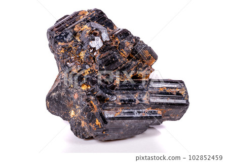 macro mineral stone sherle, schorl, black tourmaline on white background macro mineral stone sherle, schorl, black tourmaline on white background 102852459