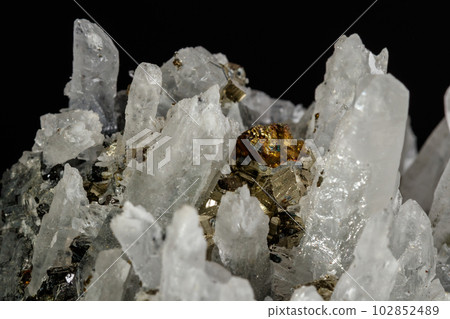 Macro mineral stone Galena, Sphalerite, Pyrite, Quartz on a black background Macro mineral stone Galena, Sphalerite, Pyrite, Quartz on a black background 102852489