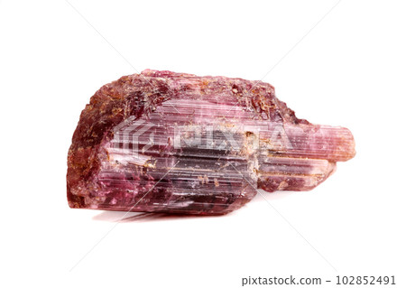 Macro mineral tourmaline stone on white background Macro mineral tourmaline stone on white background 102852491