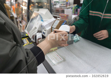 Smartphone convenience store payment 102852619