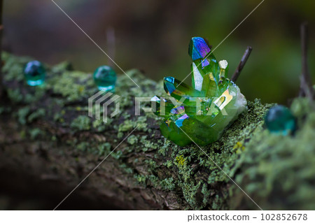 Green magical crystals in the forest Green magical crystals in the forest 102852678