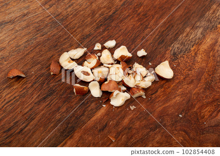 Nut Kernels Crumbs, Broken Hazelnuts Pile, Healthy Organic Crush Nuts Group, Hazel Nut Pieces 102854408