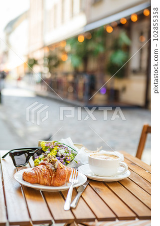 Served on the cafe's summer terrace with croissants and coffee Served on the cafe's summer terrace with croissants and coffee 102855358