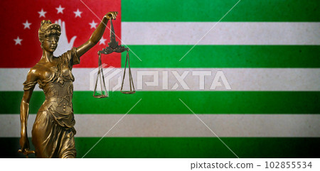 Lady Justice against a flag of Abkhazia 102855534