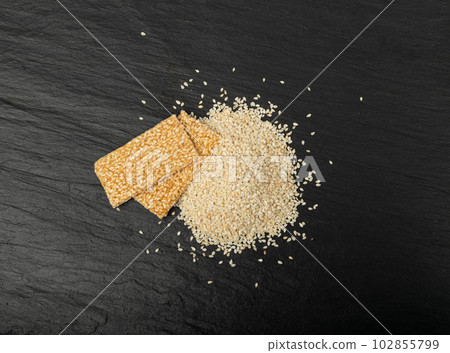 Sesame Snack, Honey Seed Cracker, Sesame Candy Bar on Black Background 102855799