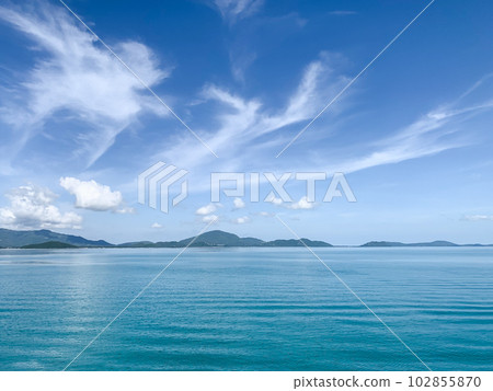 Beautiful of surface of blue ocen and blue sky with white cloud. 102855870