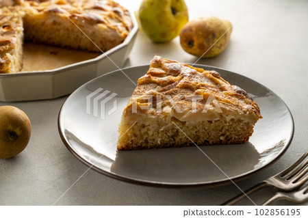 Pear pie. Slice of homemade pear pie, tart with fresh fruits. Pear pie. Slice of homemade pear pie, tart with fresh fruits. 102856195