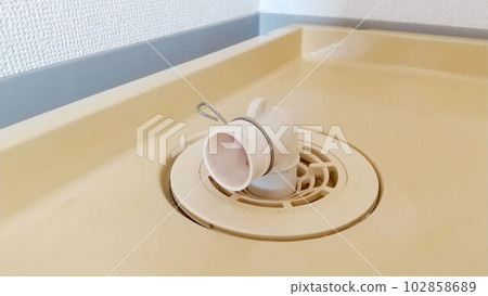 [Image corrected] Drain under the washing machine 102858689