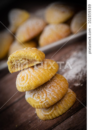 Traditional eid maamoul or mamoul cookies with dates, nuts, and jam, Arabic sweets for Aid al-Fitr Traditional eid maamoul or mamoul cookies with dates, nuts, and jam, Arabic sweets for Aid al-Fitr 102859389