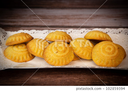 Traditional eid maamoul or mamoul cookies with dates, nuts, and jam, Arabic sweets for Aid al-Fitr Traditional eid maamoul or mamoul cookies with dates, nuts, and jam, Arabic sweets for Aid al-Fitr 102859394