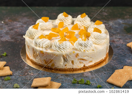 Fresh Peach Cake on a Gray Background. Healthy Summer Dessert Concept Fresh Peach Cake on a Gray Background. Healthy Summer Dessert Concept 102861419