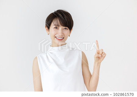 Female pointing white background Female pointing white background 102861570