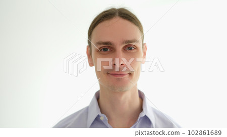 Portrait of young man in shirt on white background 102861689