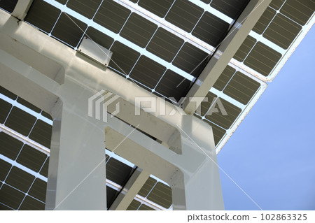 Solar photovoltaic panels mounted on metal frame for producing clean ecological electric energy. Renewable electricity with zero emission concept Solar photovoltaic panels mounted on metal frame for producing clean ecological electric energy. Renewable electricity with zero emission concept 102863325