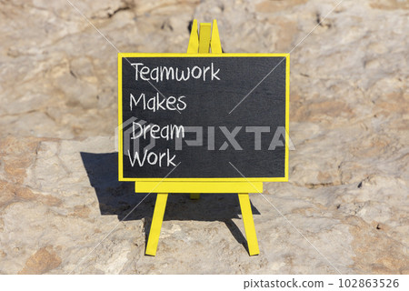 TMDW Teamwork makes dream work symbol. Concept words TMDW Teamwork makes dream work on black chalk blackboard on beautiful stone background. Business TMWD teamwork makes dream work concept. Copy space 102863526