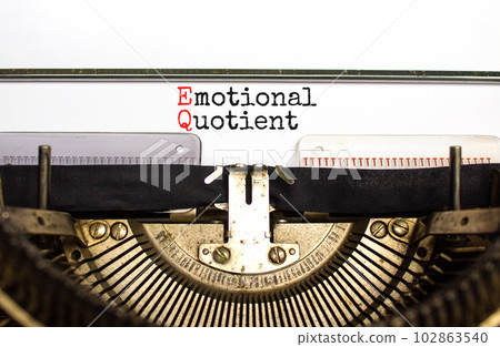 EQ emotional quotient symbol. Concept words EQ emotional quotient on white paper typed on retro typewriter. Beautiful white background. Business EQ emotional quotient concept, copy space. 102863540