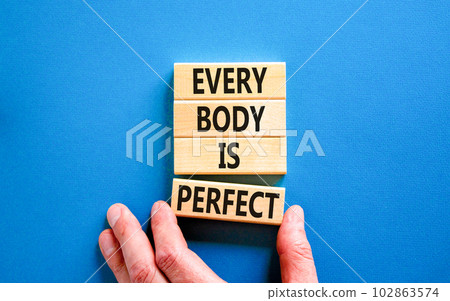 Every body is perfect symbol. Concept words Every body is perfect on wooden block. Beautiful blue table blue background. Motivational business every body is perfect concept. Copy space. 102863574