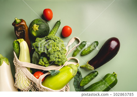 Mesh bag with organic vegetables 102863785