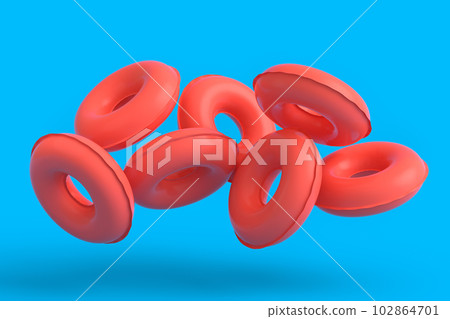 Colorful inflatable ring flying on monochrome background, summer vacation Colorful inflatable ring flying on monochrome background, summer vacation 102864701