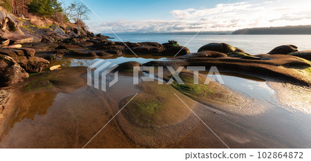 Rocky Shore on the Ocean Coast. Canadian Nature Background. Rocky Shore on the Ocean Coast. Canadian Nature Background. 102864872