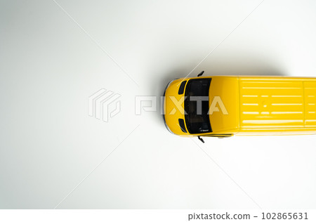 Yellow delivery van. Efficiency, speed, and reliability in transportation and logistics. E-commerce, retail, or other industries on efficient distribution networks. Delivering goods and services Yellow delivery van. Efficiency, speed, and reliability in transportation and logistics. E-commerce, retail, or other industries on efficient distribution networks. Delivering goods and services 102865631