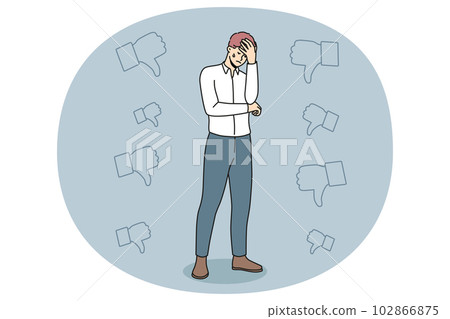 Unhappy businessman stressed with negative work feedback 102866875