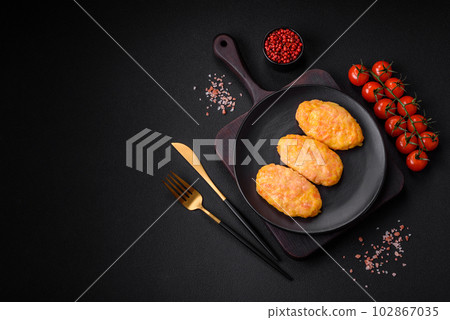 Delicious steam cutlets with carrots, cheese, salt and spices 102867035