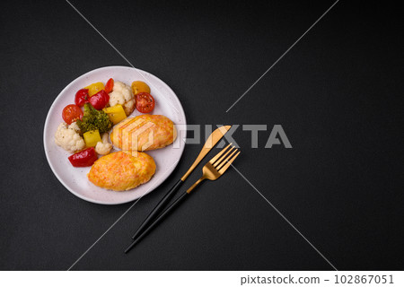 Delicious steam cutlets with carrots, cheese, salt and spices Delicious steam cutlets with carrots, cheese, salt and spices 102867051