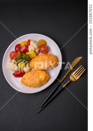 Delicious steam cutlets with carrots, cheese, salt and spices Delicious steam cutlets with carrots, cheese, salt and spices 102867052