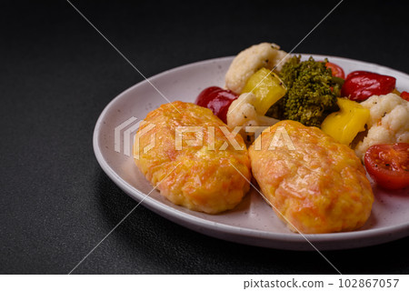 Delicious steam cutlets with carrots, cheese, salt and spices Delicious steam cutlets with carrots, cheese, salt and spices 102867057