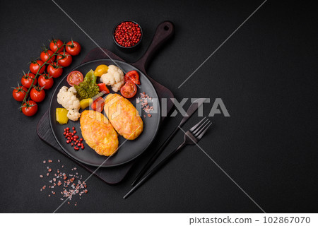 Delicious steam cutlets with carrots, cheese, salt and spices Delicious steam cutlets with carrots, cheese, salt and spices 102867070