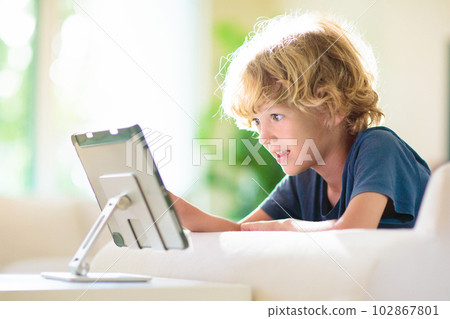 Kids with mobile phone. Child with tablet computer Kids with mobile phone. Child with tablet computer 102867801