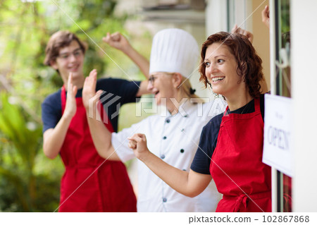 Cafe opening on first day. Open door sign. Cafe opening on first day. Open door sign. 102867868