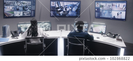 Officers monitor cameras with AI face scanning 102868822