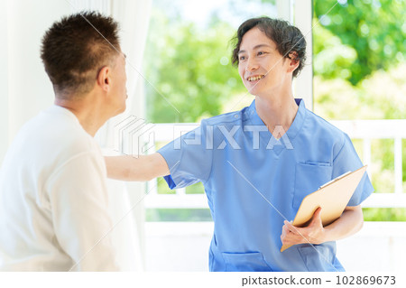 Senior man being examined by a doctor Senior man being examined by a doctor 102869673