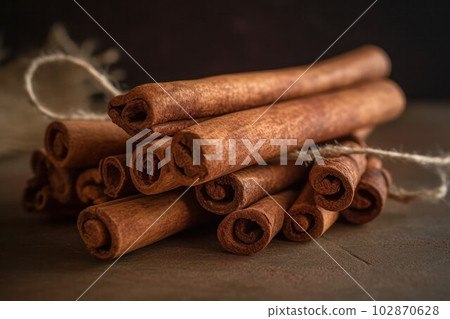 Ceylon Cinnamon Sticks on rustic background 102870628