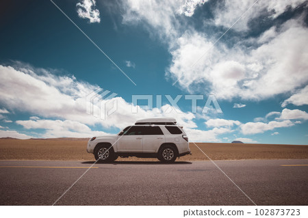 Driving off road car in tibet,China 102873723
