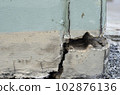 Close up Cracked concrete building or pillar cement wall broken at outside effect with earthquake 102876136