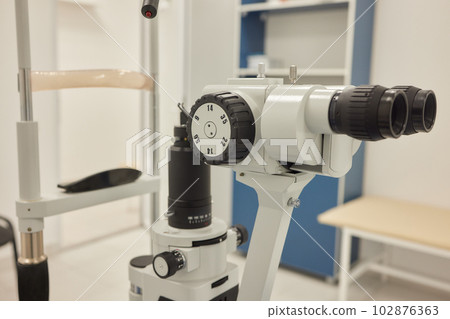 Slit lamp. Biomicroscope. Binoculars. Ophthalmic equipment.. Close up, selective focus. Health care concept. 102876363