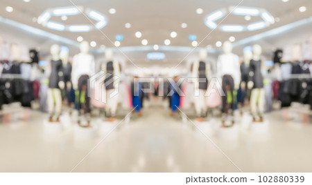 Abstract blur clothing boutique display interior of shopping mall background 102880339